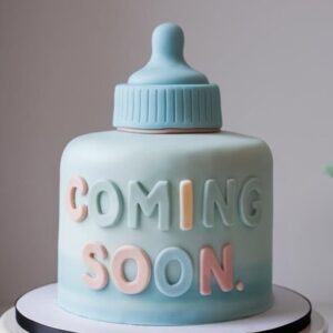 Coming Soon Baby Bottle Cake