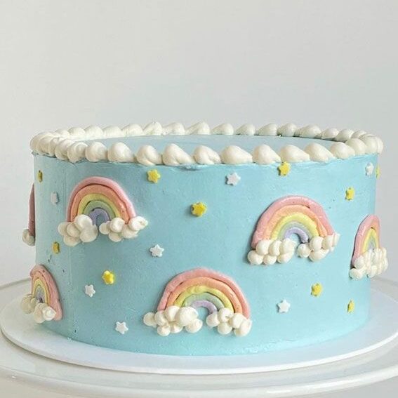 cheerful rainbow and cloud cake